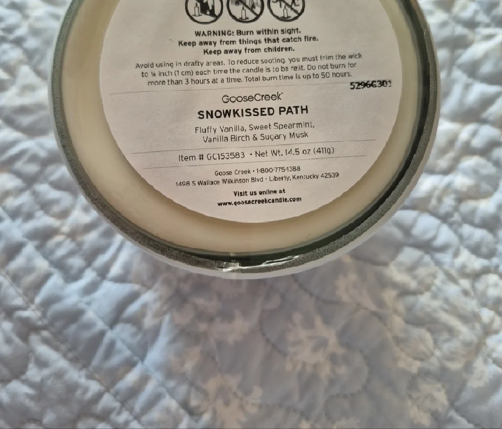 Elegant White Candle with Silver Lid